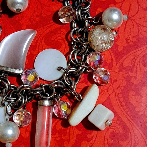 Metal bracelet with shells and glass beads like new, white and silver