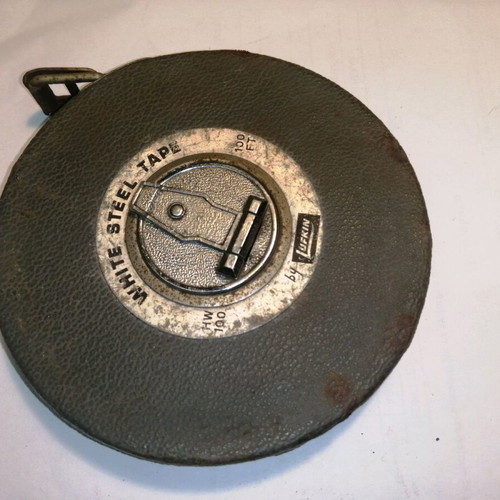 Measuring tape used, American, with inches or feet