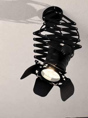 Industrial spotlight with scissor arm used, metal, black matte finish