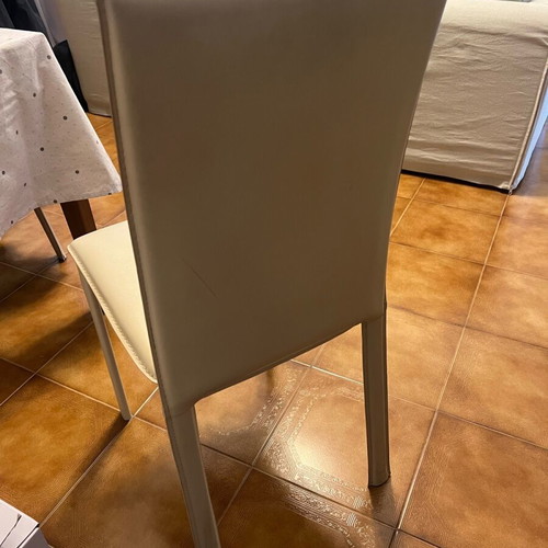 Chairs set of four used, ecru leatherette