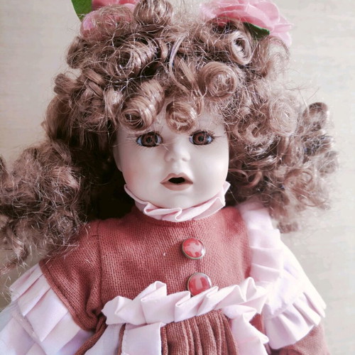 Porcelain doll like new