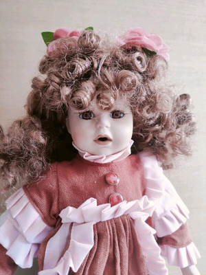 Porcelain doll like new