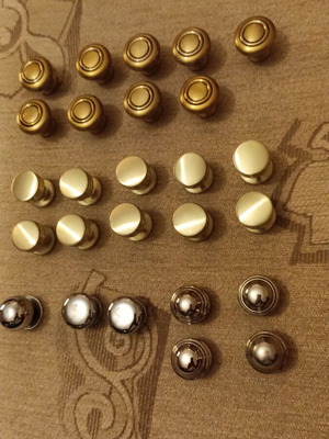 Handles and knobs for cabinets and drawers used, 24 pieces gold and silver