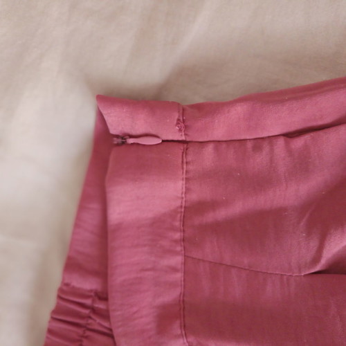 High-waisted pants used, satin fabric