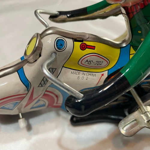 Motorcyclist old tin toy like new