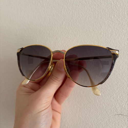 Vogart vintage sunglasses used with gold frame and silver details