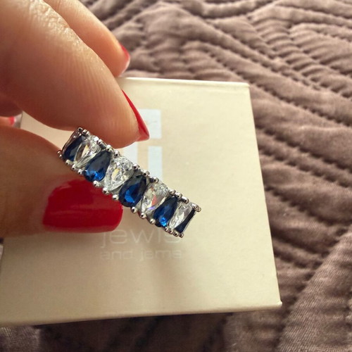 Silver full band ring with blue and white zircons, new