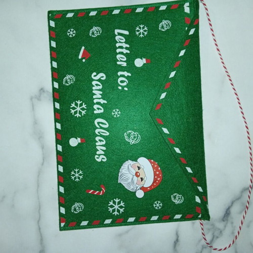 Christmas decorative felt envelope like new, green with Santa Claus design