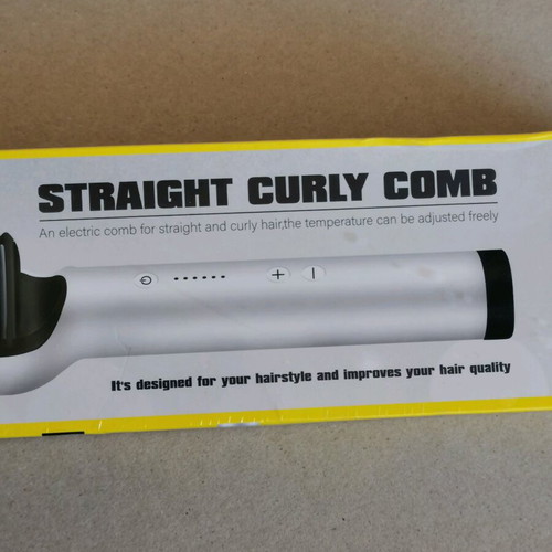 Electric comb for straightening and curling hair brand new