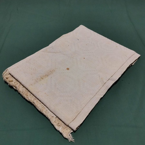 Woven piqué blanket used with wear from 1930 era