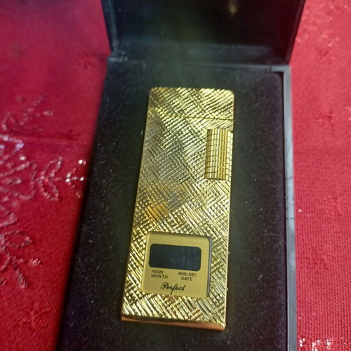 Lcd Gold Lighter with Clock and Date like new