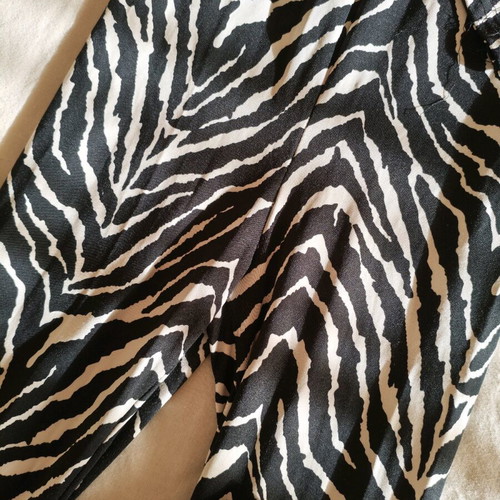 Zebre one-piece suit size S like new