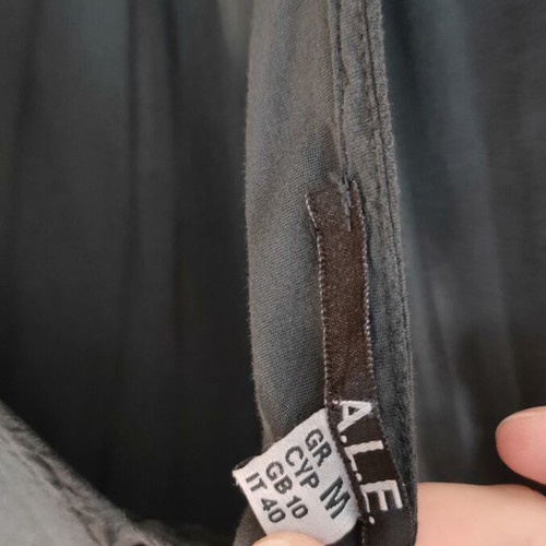 A.L.E. dress medium with black slip, like new