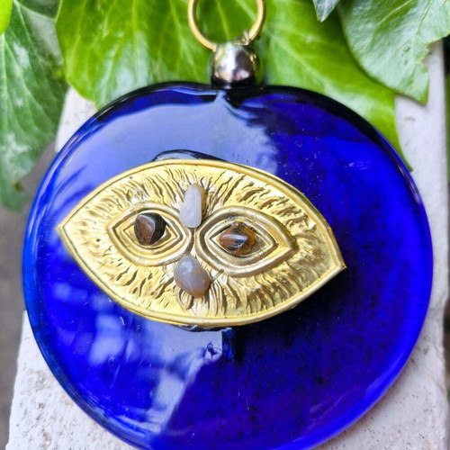 Evil eye charm new, made of blown glass, bronze and semi-precious stones