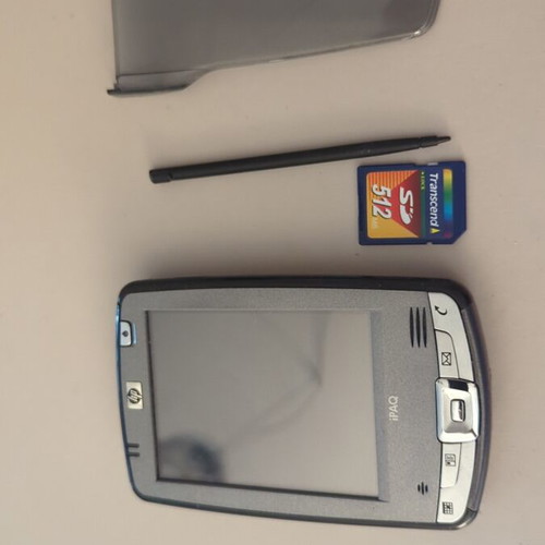 HP iPAQ HX2490b PDA used with charging dock and accessories