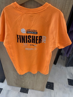 Collectible unisex children's triathlon shirt, like new, orange