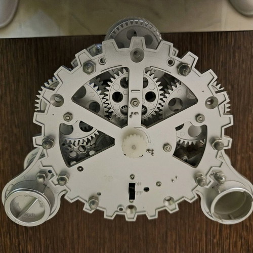 Decorative clock used, plastic with batteries, missing one battery cover