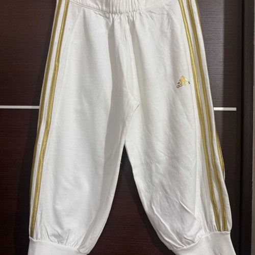Adidas kids tracksuit new, white with gold stripes, size 14 or Small