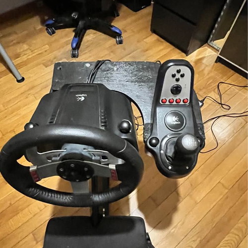 Playseat WRC sim racing seat with Logitech G27 wheel and H-shifter