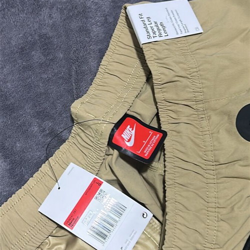 Nike pants new beige size L