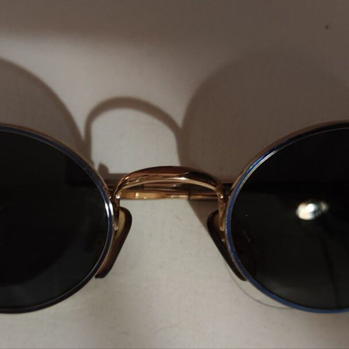 Vogue children's sunglasses like new, black and gold