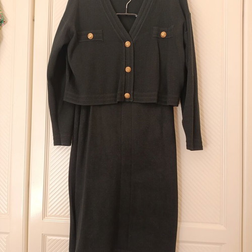 Classic fine knit skirt and blouse set with gold buttons