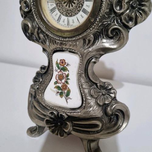 Antique clock used with German mechanism and porcelain decoration