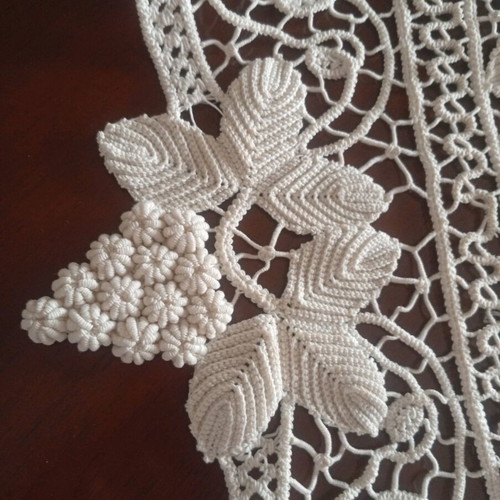 Antique handmade crochet table linen with grape cluster design used
