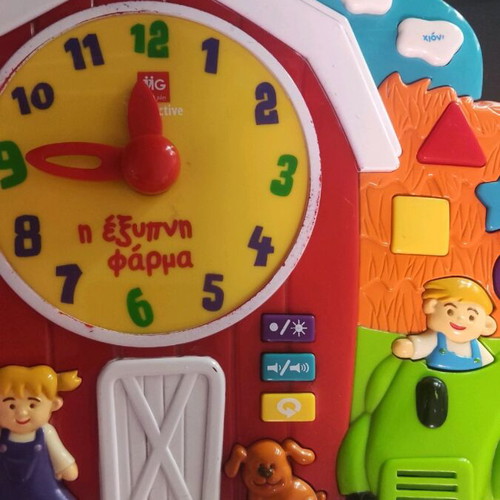 Educational toy The Smart Farm used with time and weather learning
