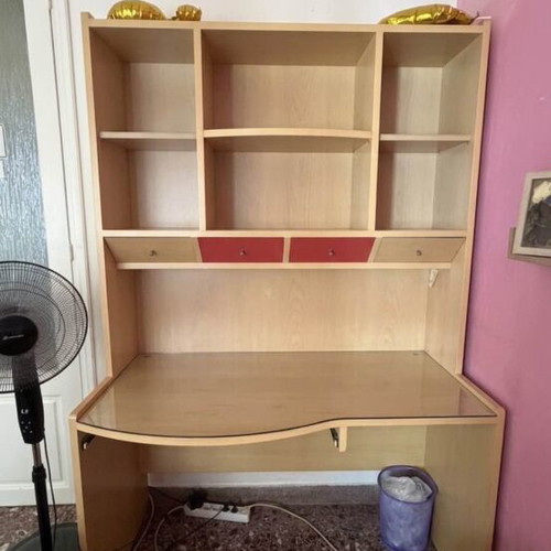Desk-library for children's room used with glass surface and shelves