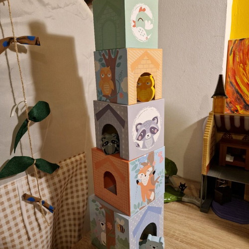 Small Foot stacking toy cubes and animals used