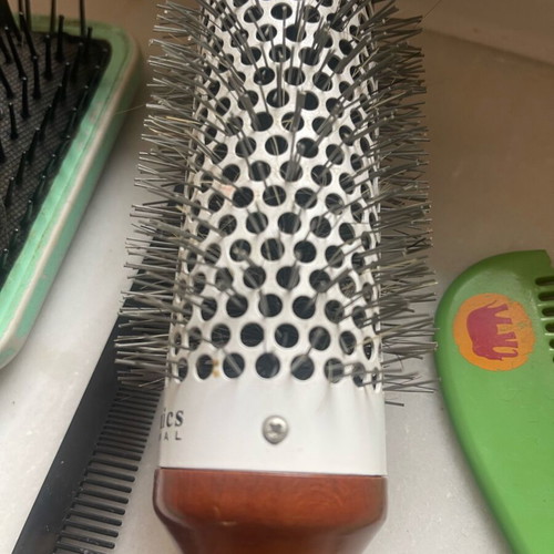 Collection of used combs and brushes