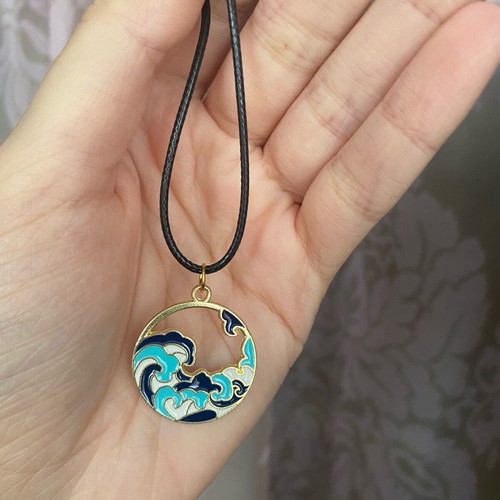 The Wave unisex necklace new with black cord
