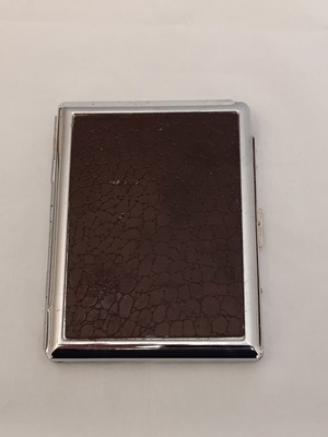 Old cigarette case with built-in lighter used, 1980s metal corporate gift