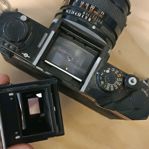 Canon F-1 with 50mm f/1.4 lens used with original leather case