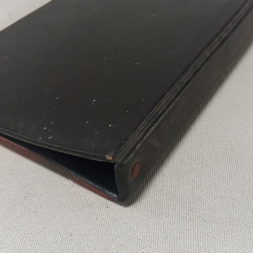 Vintage photo album used, orange and black checkered