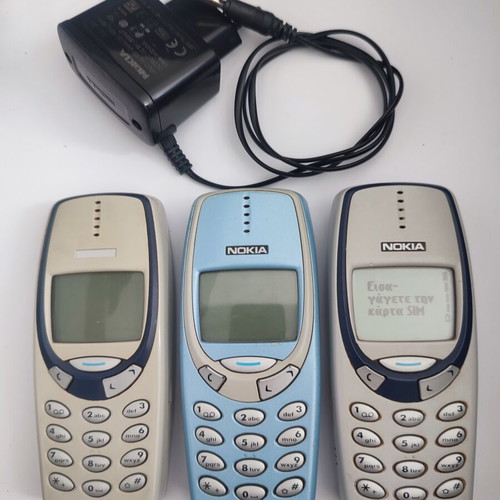 Nokia 3310 Classic Phone used with charger, retro vintage model