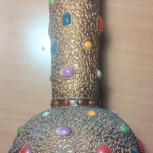Handmade vase from Peru used with 56 different stones