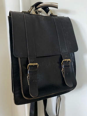 Leather messenger style backpack used, black