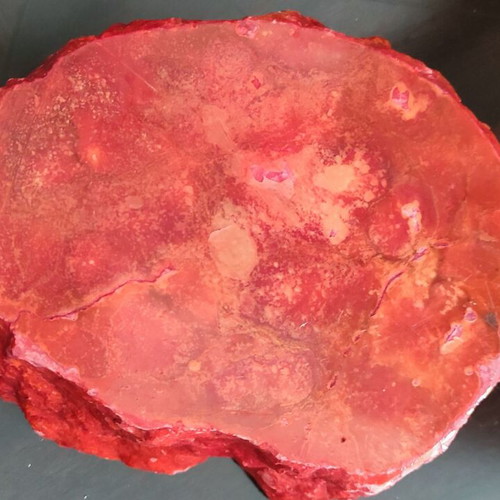Large ashtray used red with veins