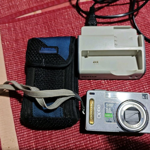 Pentax Optio SVi digital camera used with case and charger