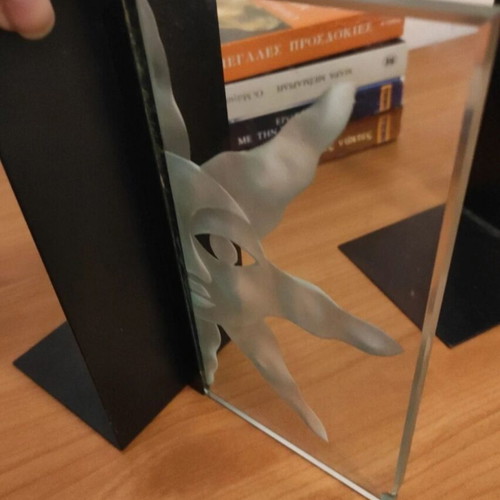 Bookends set like new, metal and glass with embossed design