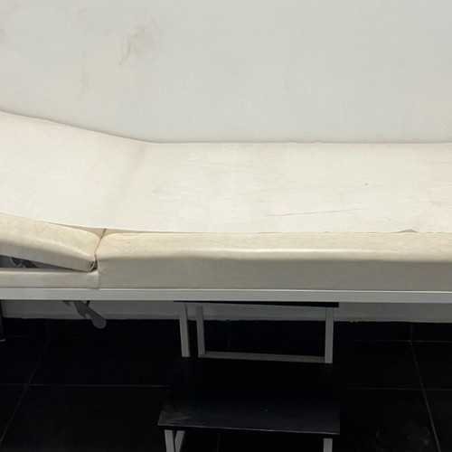 Folding examination bed for aesthetic treatments and massage
