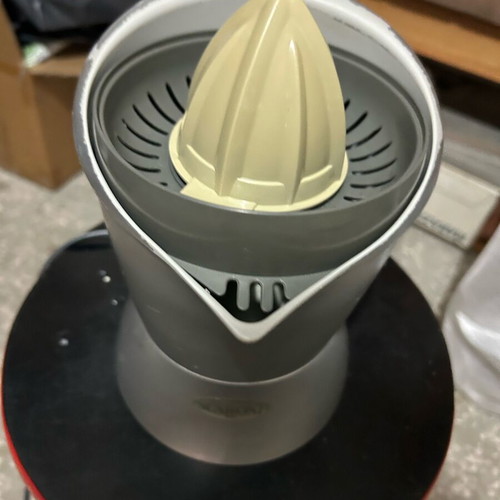 Scaroni electric juicer used with normal wear on metal edge