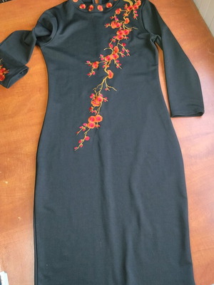 Black dress knee-length with beautiful embroidery used