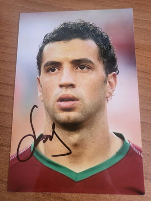 Authentic Simao autograph on photo like new