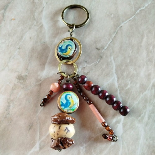 Purse charm keychain new, handmade with wood beads and almond shells