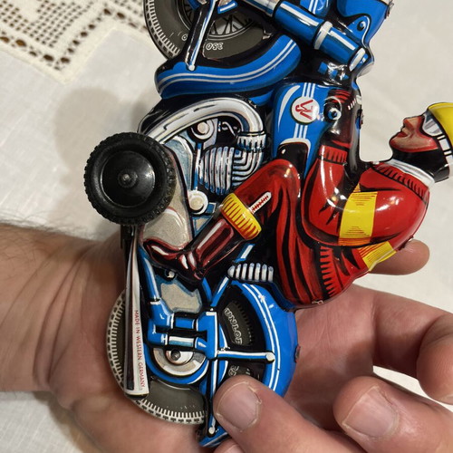 Motorcyclist tin toy like new, made in West Germany