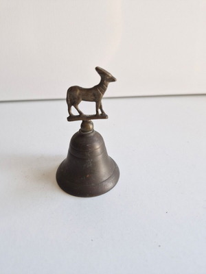 Brass bell used with ram figure decoration