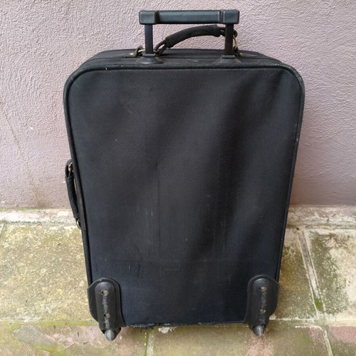 Wheeled suitcase used black